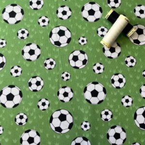 Footballs on Green